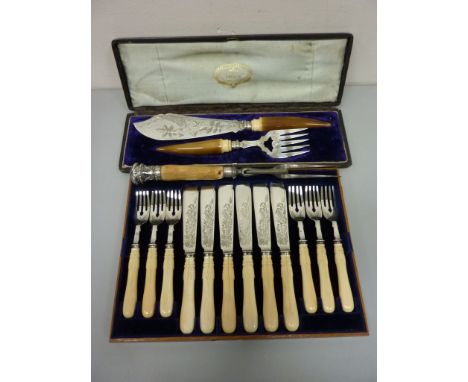 Victorian carving fork with hallmarked silver mounts, set of Thomas Turner & Company silver-plated fish servers in presentati