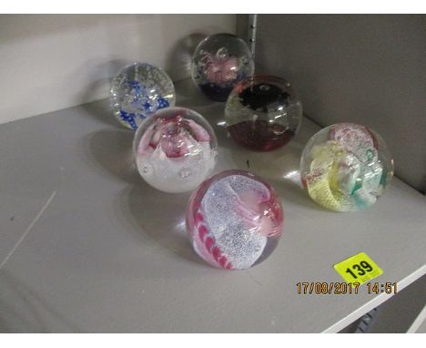 Six Caithness glass paperweights