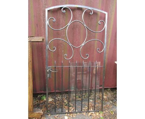 A large modern, wrought steel gate, 70 1/2 h x 30 w