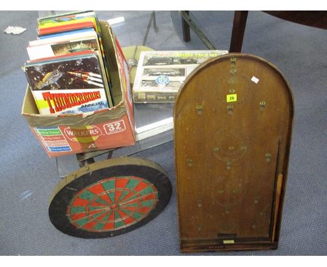 A vintage Bagatelle board with steel balls, together with a dart board, a Western train set and a mixed selection of twenty o