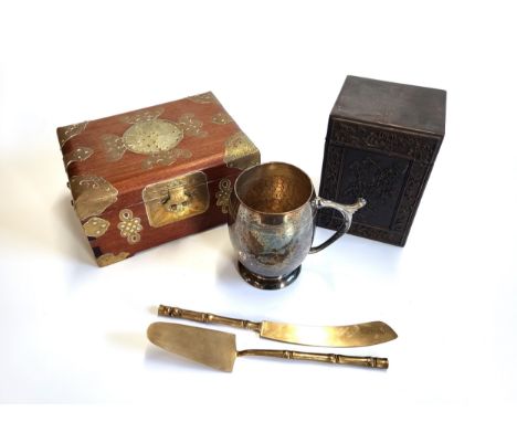 A wooden and lined tea caddy with hinged lid and a foliate design on one side 17cm x 11cm, a Chinese wooden and brass jewelle