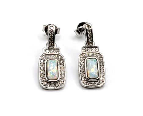 A pair of silver cubic zirconia and opal panelled earrings 2.9gms 2cm drop.