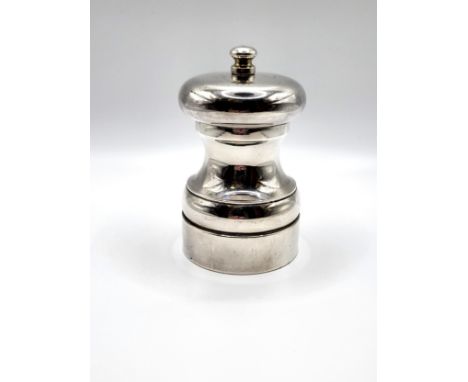 A silver London 1987 pepper grinder by Douglas Bell.