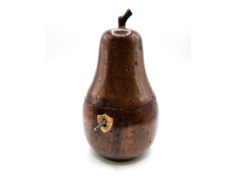 A Georgian style fruitwood pear shaped tea caddy with key. 294gms. 19cm.