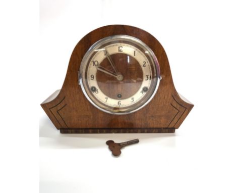 A 1950's mantle clock with key. 34cm x 23cm
