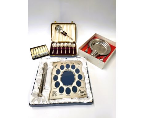 A collection of silver plate including a boxed Leonardo Collection My First Year photo frame and birth certificate holder, a 