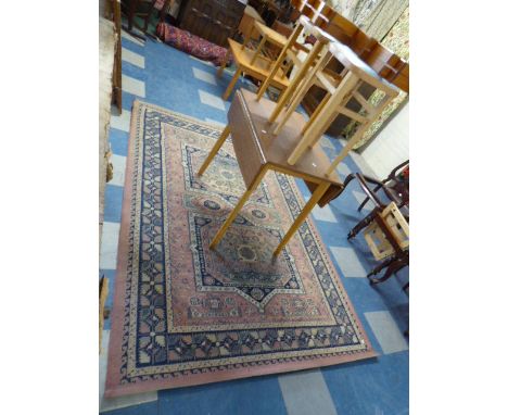 A Formica Drop Leaf Kitchen Table, Two Stools, Rug and Shelf Unit