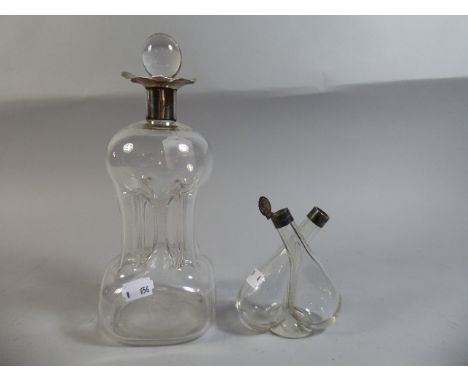 A Silver Mounted Decanter and Silver Mounted Oil/Vinegar Bottles 