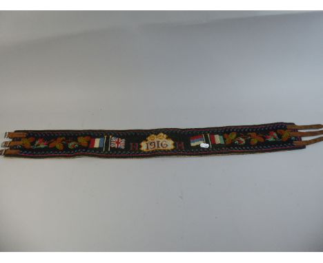 A WWI Tapestry Belt Monogrammed HH and Dated 1916 Decorated with the Flags of The Allies and Acorns, 95cm Long