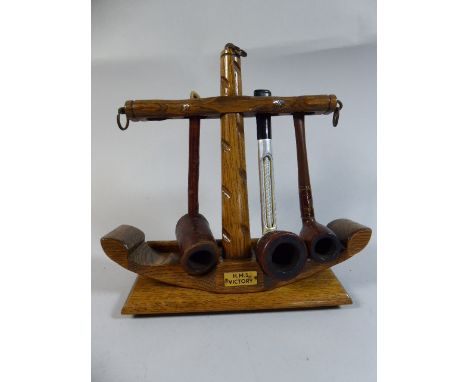 A Novelty Pipe Rack in the form of an Anchor made from Timbers from HMS Victory, Complete with Three Pipes