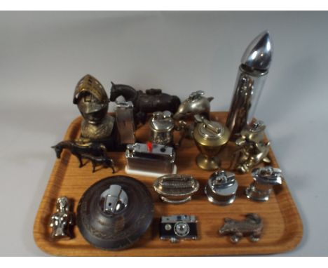 A Collection of Novelty Lighters in the form of Shell, Camera, Dolphins, Horses, Topless Girl, Knight etc (16 in Total)