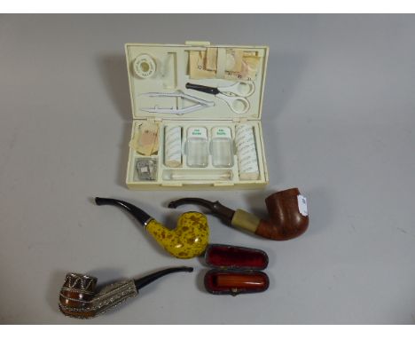 A Collection of Three Vintage Pipes, Amber Cheroot Holder, First Aid Box Etc