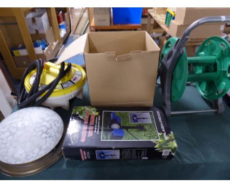 A Garden Electric Extension Socket with Timer, Ceiling Lamp and Hose Reel 
