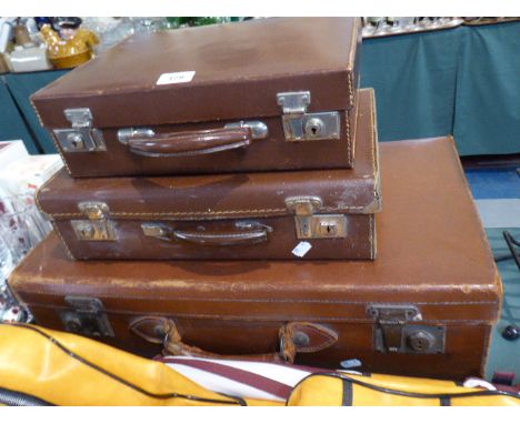A Collection of Three Vintage Suitcases