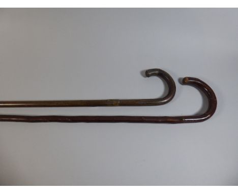 Two Vintage Walking Sticks