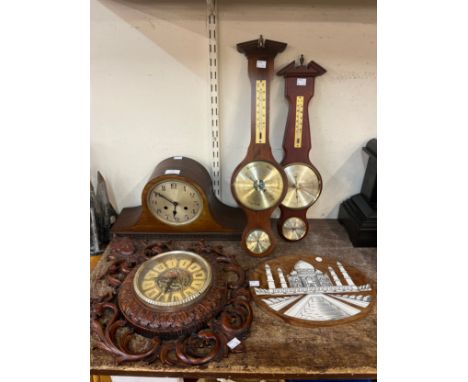 Three aneroid barometers, a mantle clock and in Indian hardwood and faux ivory wall plaque, depicting the Taj Mahal 