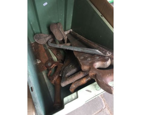 A box with mainly saws and other tools 
