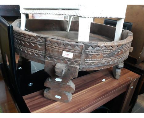 An ethnic/rustic carved wooden planter or occasional table of some description. 