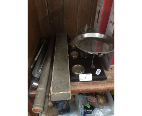 Apothecary scales with weights 