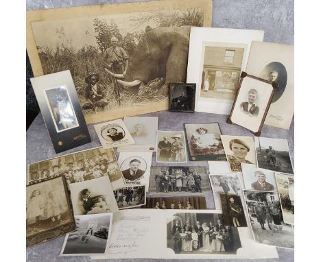 Photography -a large silver gelatin sepia photograph of Zimbabwean big game; Victorian ambrotype portrait; A Danish shopfront