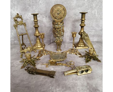 A pair of 19th century brass candlesticks the bases in the form of butterflies; a pair brass ejector candlesticks; a brass pi