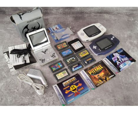 Game Boy Advance SP AGS-001 Console, Limited&nbsp; Tribal Edition, Silver, original box; various games including Pitfall, ZOO