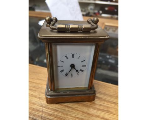 Miniature brass carriage clock 