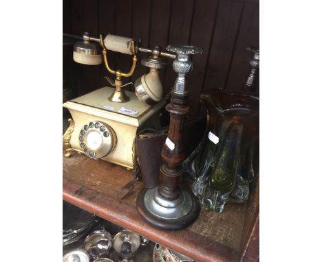 Telephone, glass vase, candelsticks and folding camera 