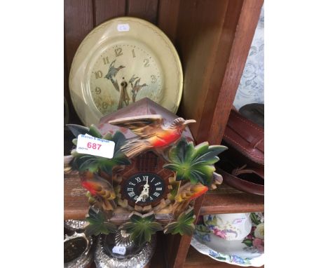 Cuckoo clock and clock plate 
