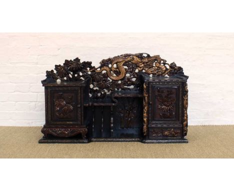 An Early 20th Century Japanese Carved and Pierced Hardwood Desktop Cabinet An Early 20th Century Japanese Carved and Pierced 