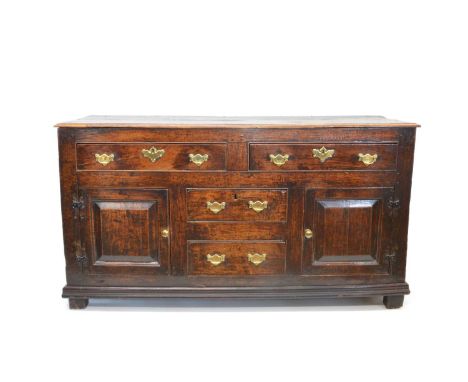 Mid 18th Century Joined Oak Dresser Base Rectangular two plank top with a moulded edge, over an arrangement of four frieze dr