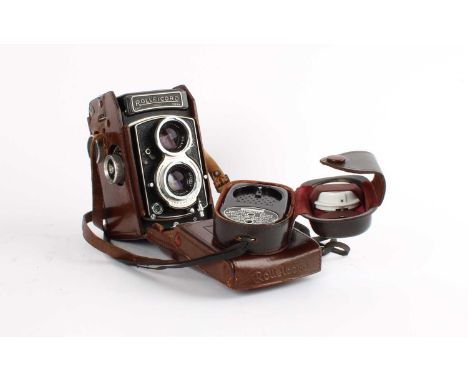 A Rolleicord Twin-Lens Camera A Rolleicord Twin-Lens Camera, serial no. 1558004, the upper lens Heiosmat 1:3,2/75, the lower 