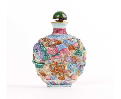 A Chinese Famille Rose Relief Moulded Snuff Bottle A Chinese Famille Rose Relief Moulded Snuff Bottle, Qianlong mark but like