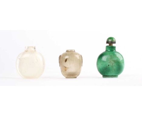 Three Chinese Snuff Bottles Three Chinese Snuff Bottles, late Qing, the first carved rock crystal, lacking stopper, the secon