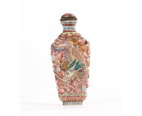 A Chinese Famille Rose Relief Moulded Snuff Bottle A Chinese Famille Rose Relief Moulded Snuff Bottle, Qianlong mark but like