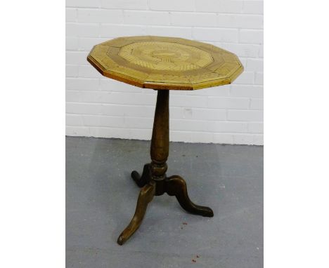 A tilt top table, the marquetry top on a baluster column and tripod supports, 70 x 55cm