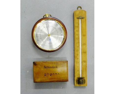 A mixed lot to include an olive wood Jerusalem box, a vintage wall thermometer and a small FCC wall barometer (3)