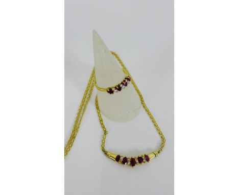 A 9 carat gold diamond and ruby set dress ring together with a matching ruby and diamond set necklace on 9 carat gold chain (