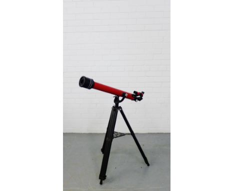 A Tasco 58T telescope on tripod stand