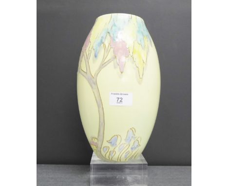 A Carlton ware baluster vase, the cream ground with tube lined tree and bluebell pattern, No.3943, 27cm high