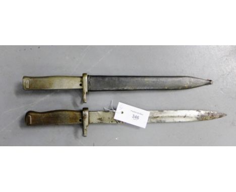 A German WWI all steel Ersatz bayonet and scabbard, blade length approx 30cm, together with another German bayonet lacking it