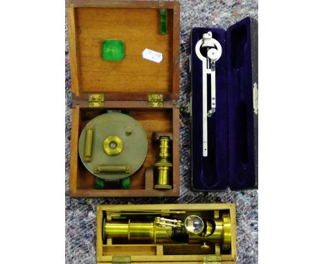 A draftsman's instrument in fitted case, together with a mahogany cased compass and a monocular brass microscope (3)