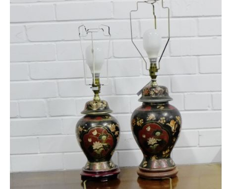 A pair of Chinese baluster table lamps the black ground with birds and foliage and coloured enamels on turned hardwood bases,