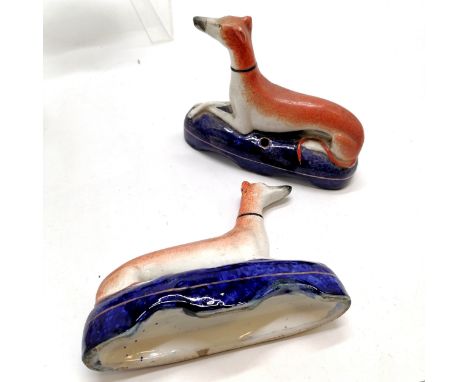 Pair of Staffordshire pottery greyhound inkwell figures - 14cm high x 17cm across ~ no obvious damage 