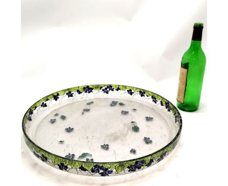 Large antique Arts &amp; Crafts glass dish with floral enamel decoration - 45cm diameter and has signs of wear to interior ot
