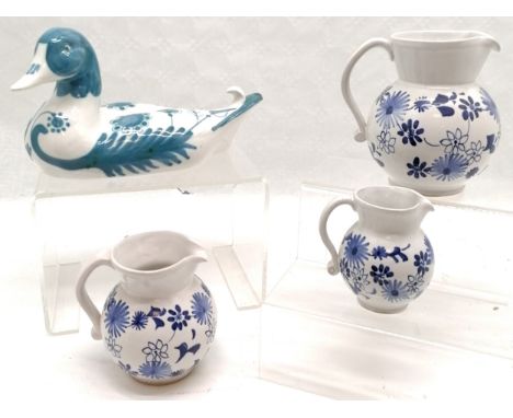 Rye pottery model of a duck (26.5cm long) signed D T Sharp t/w 3 graduated decorated jugs (middle jug has chip) 