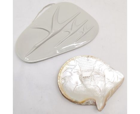 German porcelain wall plaque of formation flying birds, slight chip to back, 33.5 cm wide, 21 cm high, t/w carved mother of p