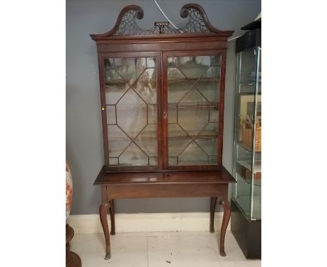 Antique mahogany part 2 door glazed bookcase, with carved scroll fretwork pediment a/f, 2 glass panel a/f, on later mahogany 