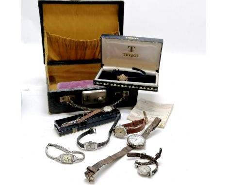 9ct gold cased ladies Tissot manual wind wristwatch (15mm diameter) &amp; running in original box with booklet, silver cased 