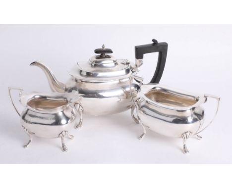 A Geo V silver three piece tea service, Walker &amp; Hall, approx 42.60 oz.